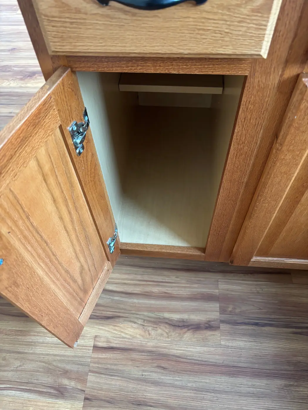 After cleaning: cabinet under the sink